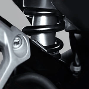 Menggunakan suspensi belakang tunggal untuk peredaman optimal, manuver lincah dan tampil lebih sporty.