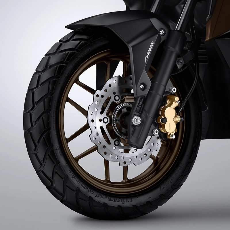 Sistem pengereman dengan wavy disc brake pada bagian depan dan belakang untuk memberikan kemampuan pengereman lebih baik dan memberikan kesan gagah pada sepeda motor.